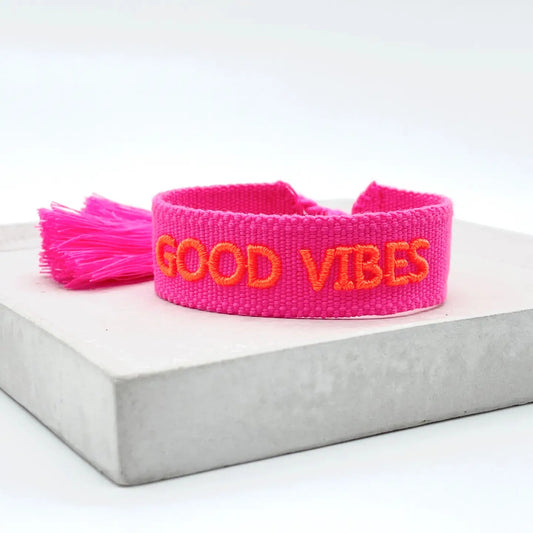Webarmband "Good Vibes" neon pink/neon coral